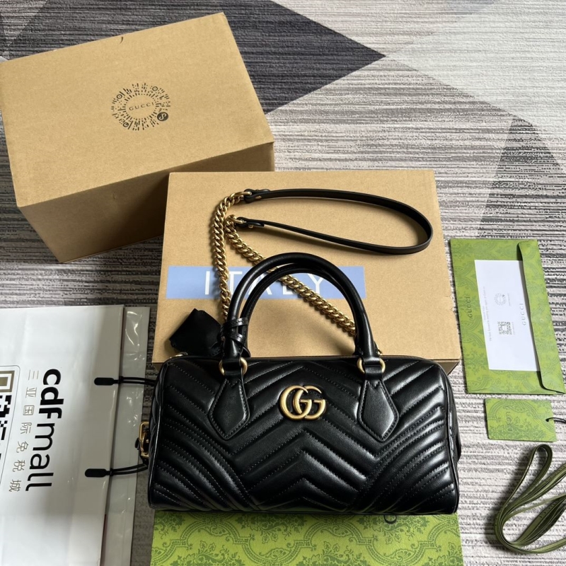 G*u*i top handle bags